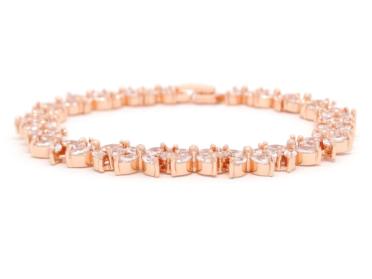 Rose gold bracelet on a white background