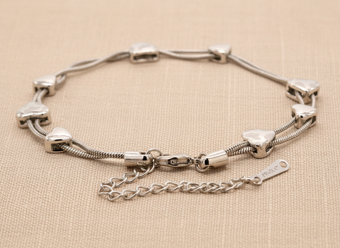 White Gold Snake Chain Bracelet With Heart Charms