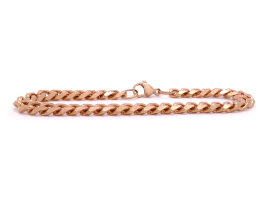 Rose gold chain bracelet on a white background